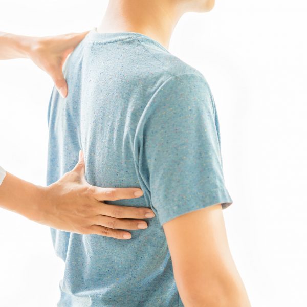 close-up-of-physiotherapist-working-with-patient-in-clinic close-up-of-physiotherapist-working-with-patient-in-clinic